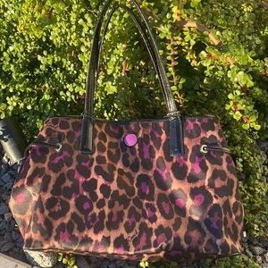 Slightly used Coach with tears by the handles .. see pictures Please